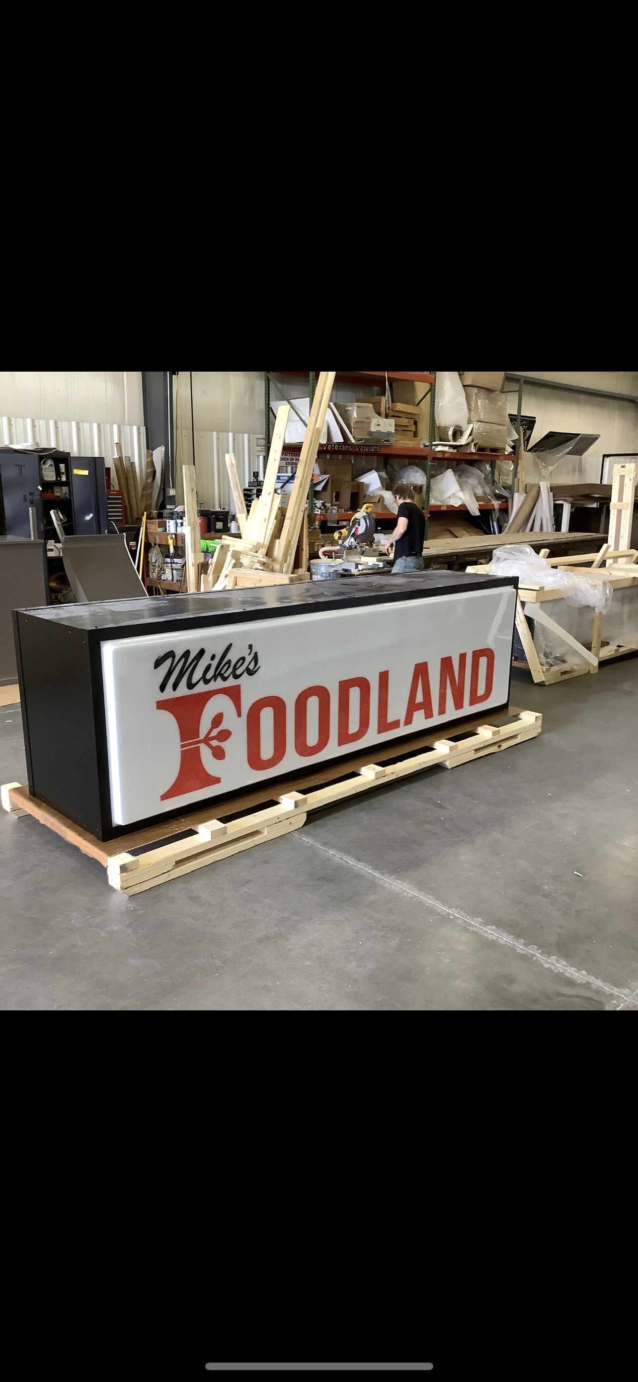 Mike's Foodland illuminated cabinet sign during fabrication