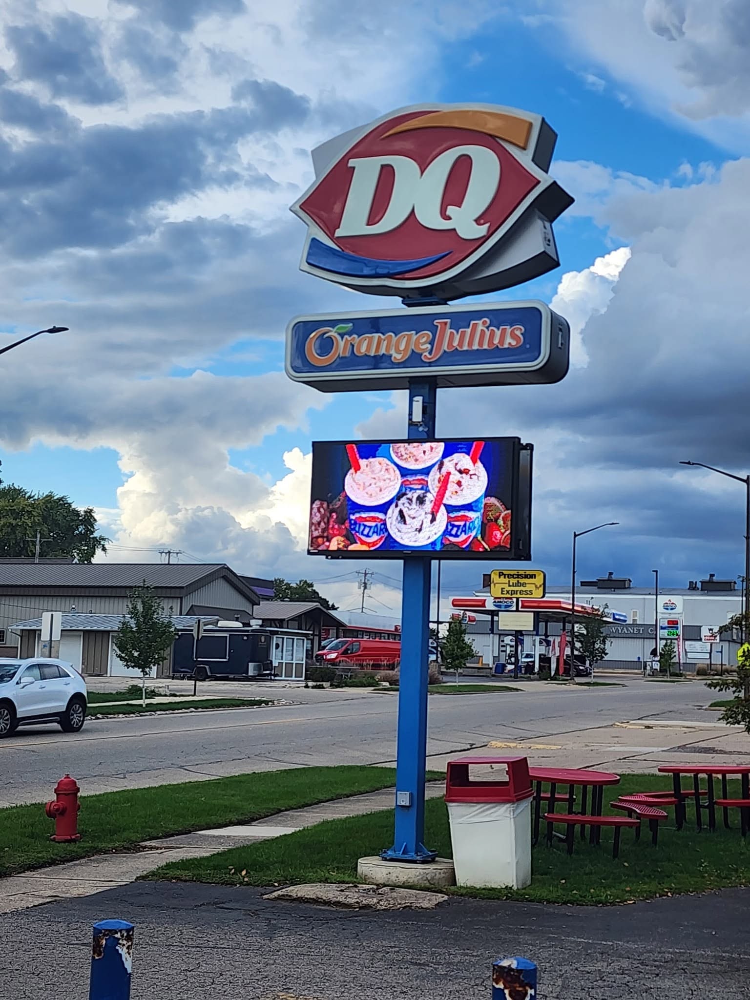 Full-color programmable LED display showing a photo-quality menu graphic