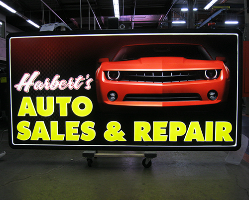 Custom illuminated automotive sales and repair sign