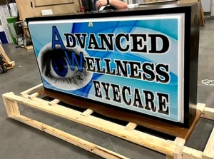 Advanced Wellness Eyecare Sign during fabrication in the shop