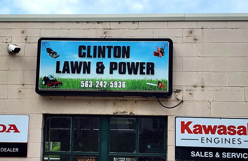 Clinton Lawn & Power Storefront Sign in its installed setting