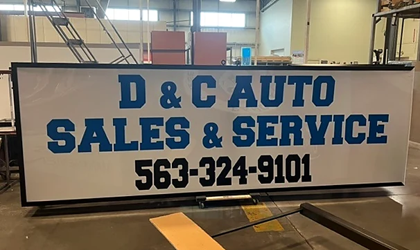 D & C Auto Sales & Service Sign during fabrication in the shop