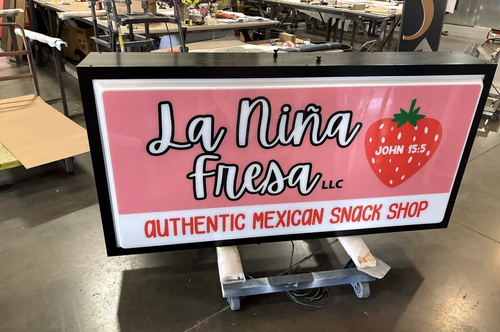 La Niña Fresa Sign during fabrication in the shop
