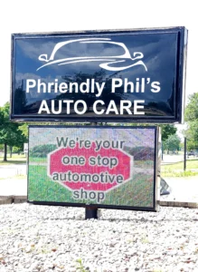 Phriendly Phil’s Auto Care Sign in its installed setting