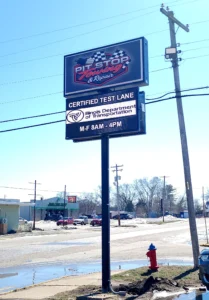 Pit Stop Towing & Repair Digital Sign in its installed setting