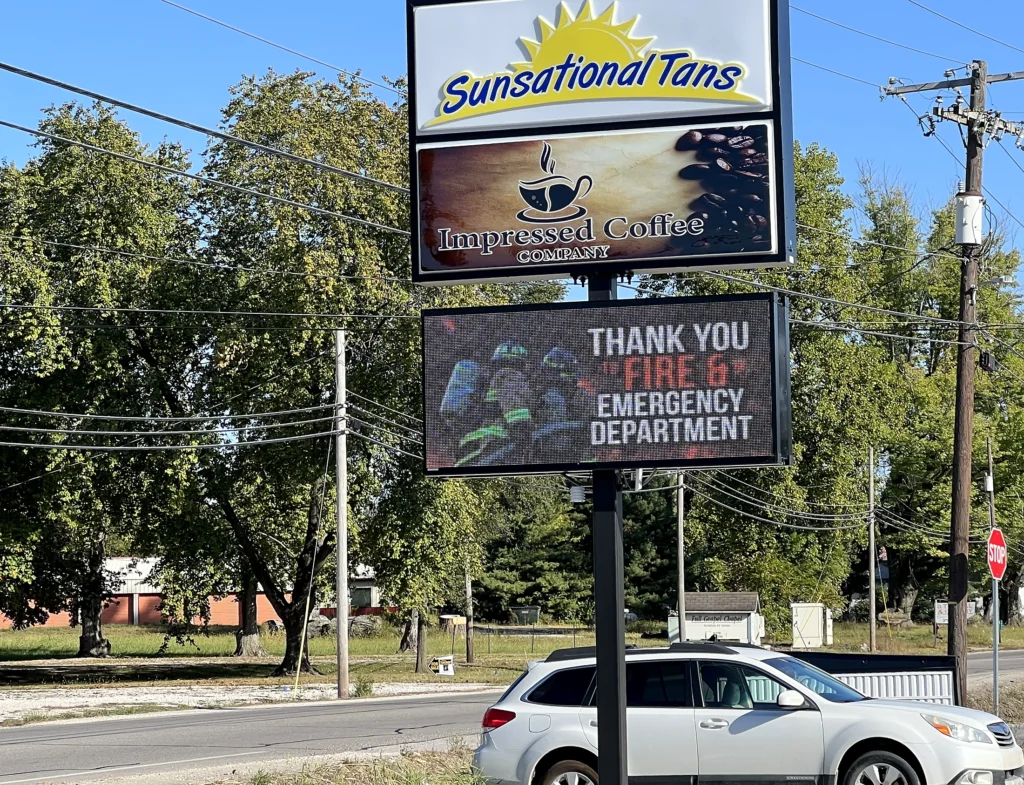 Sunsational Tans & Impressed Coffee Digital Sign in its installed setting