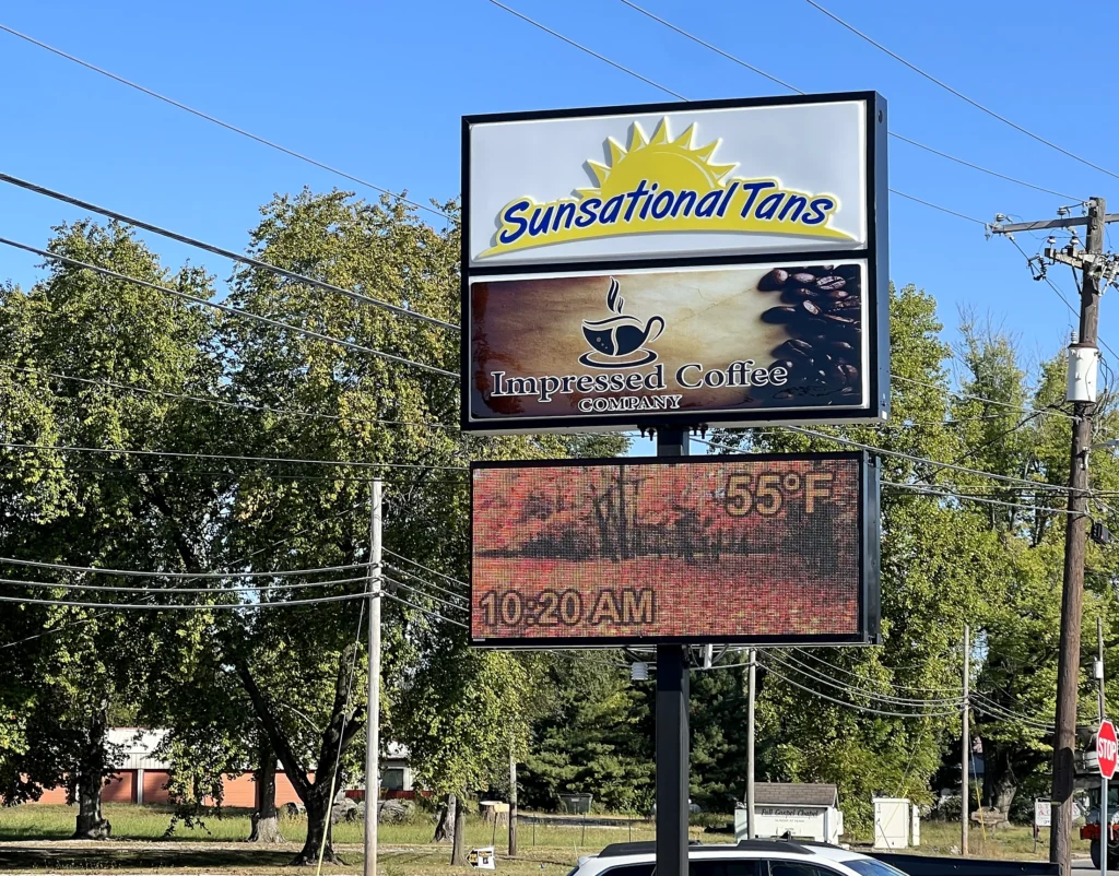 Sunsational Tans & Impressed Coffee Digital Sign in its installed setting