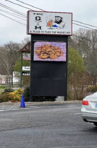 The Gym Bar & Grill Digital Sign in its installed setting