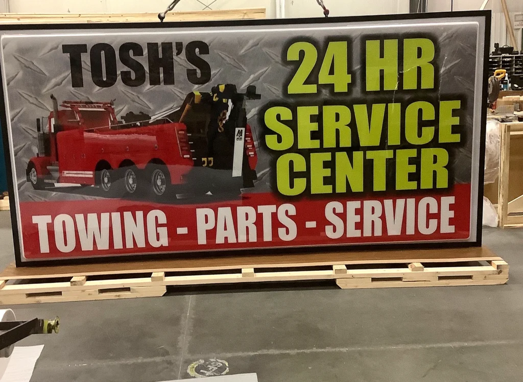 Tosh’s 24 HR Service Center Sign during fabrication in the shop